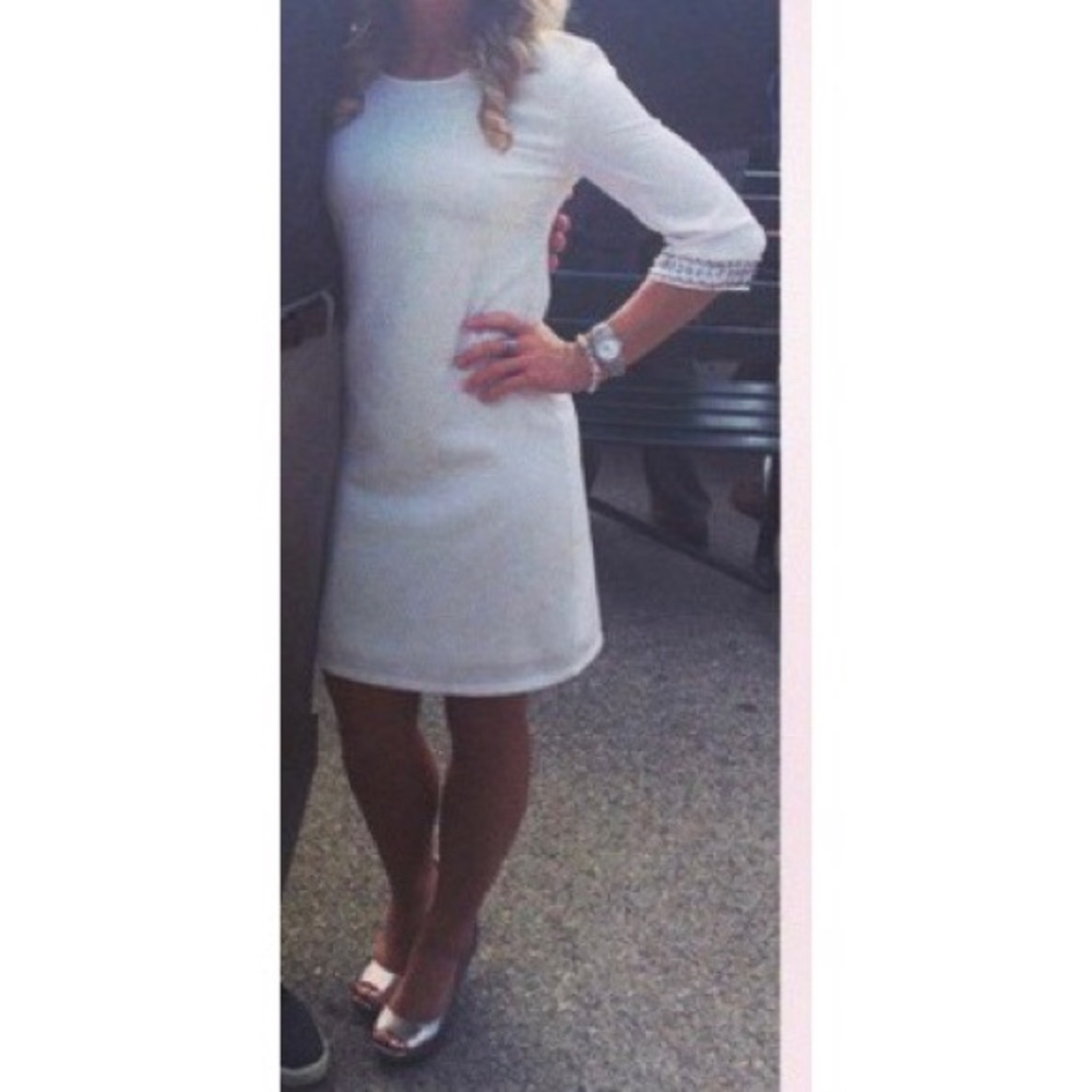 White dress with detailed sleeves